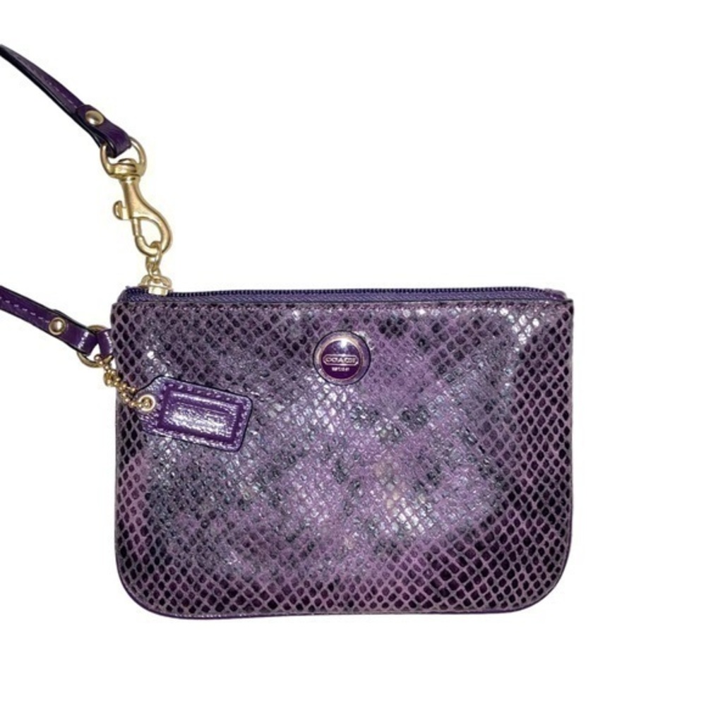 Coach purple snakeskin embossed leather wristlet bag